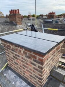 Ventilated lead chimney cap fitted to a brick chimney stack in York